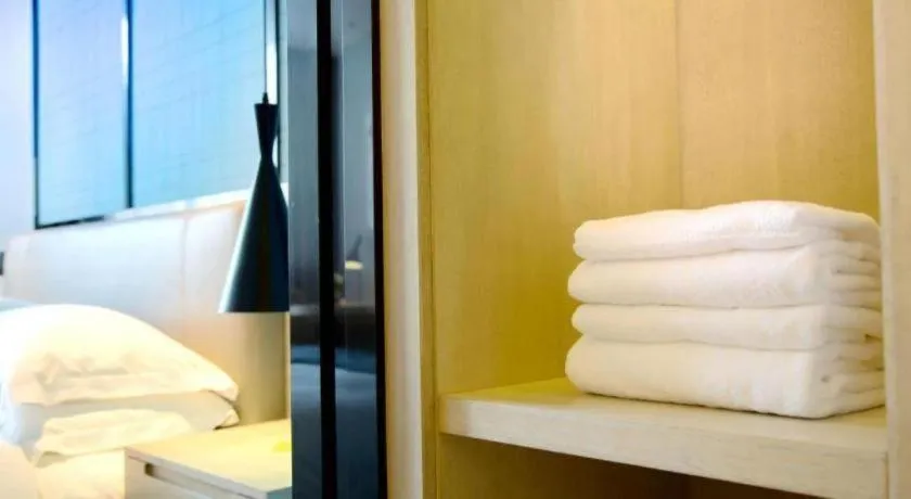 Bed in Echarm Hotel Kunming High-speed Railway South Station Chunrong Street Metro Station