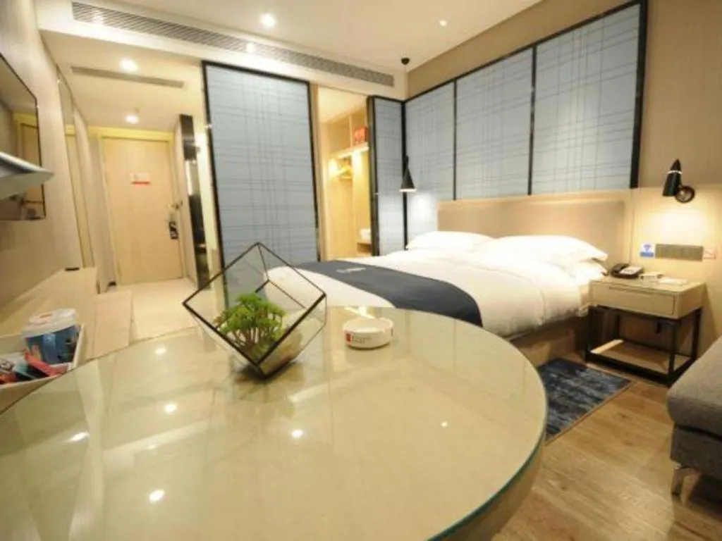 Bed in Echarm Hotel Kunming High-speed Railway South Station Chunrong Street Metro Station