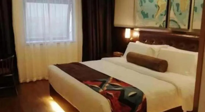 Bed in James Joyce Coffetel Guilin Railway Station Xiangbi Mountain Liangjiang Sihu Wharf