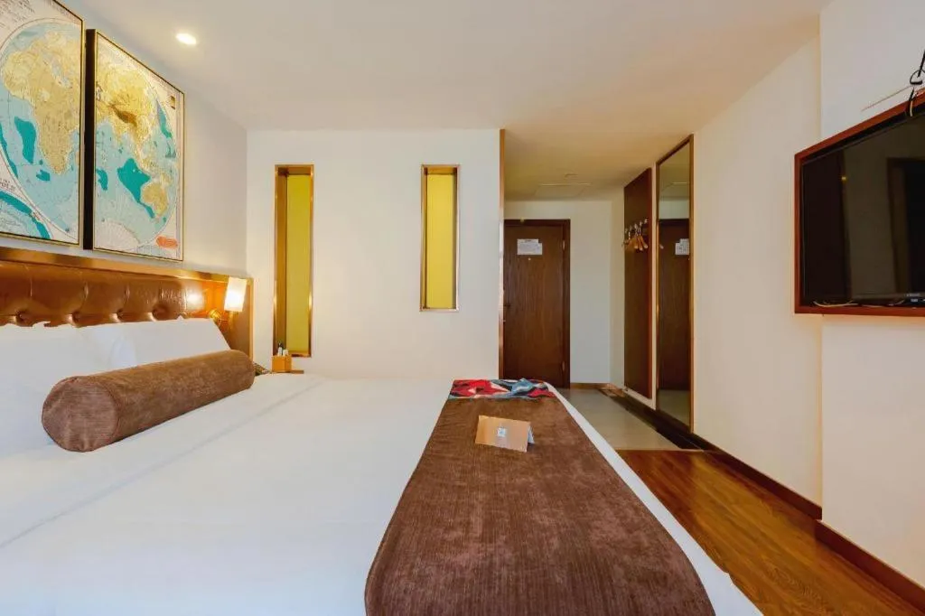 Bed in James Joyce Coffetel Guilin Railway Station Xiangbi Mountain Liangjiang Sihu Wharf