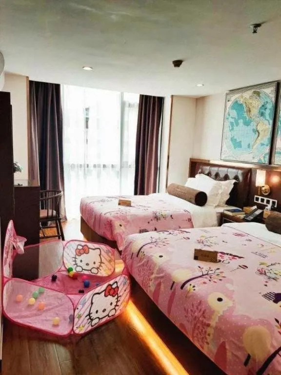 Bed in James Joyce Coffetel Guilin Railway Station Xiangbi Mountain Liangjiang Sihu Wharf