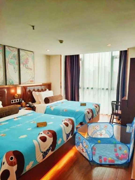 Bed in James Joyce Coffetel Guilin Railway Station Xiangbi Mountain Liangjiang Sihu Wharf