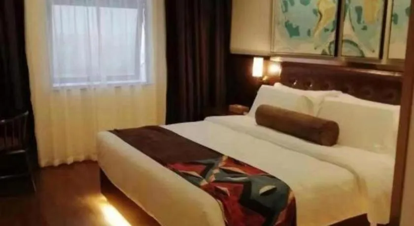 Bed in James Joyce Coffetel Guilin Railway Station Xiangbi Mountain Liangjiang Sihu Wharf