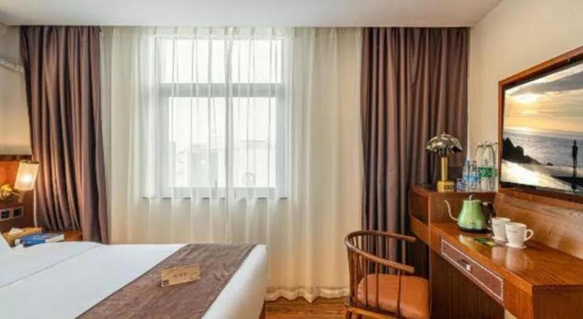 Bed in James Joyce Coffetel Guilin Railway Station Xiangbi Mountain Liangjiang Sihu Wharf