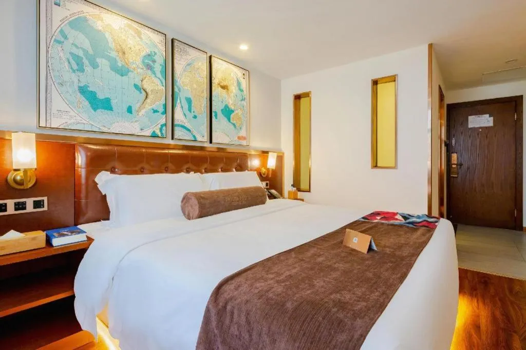 Bed in James Joyce Coffetel Guilin Railway Station Xiangbi Mountain Liangjiang Sihu Wharf