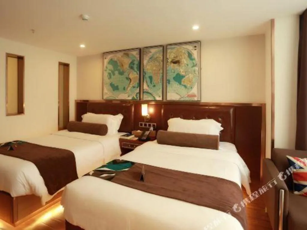 Bed in James Joyce Coffetel Guilin Railway Station Xiangbi Mountain Liangjiang Sihu Wharf