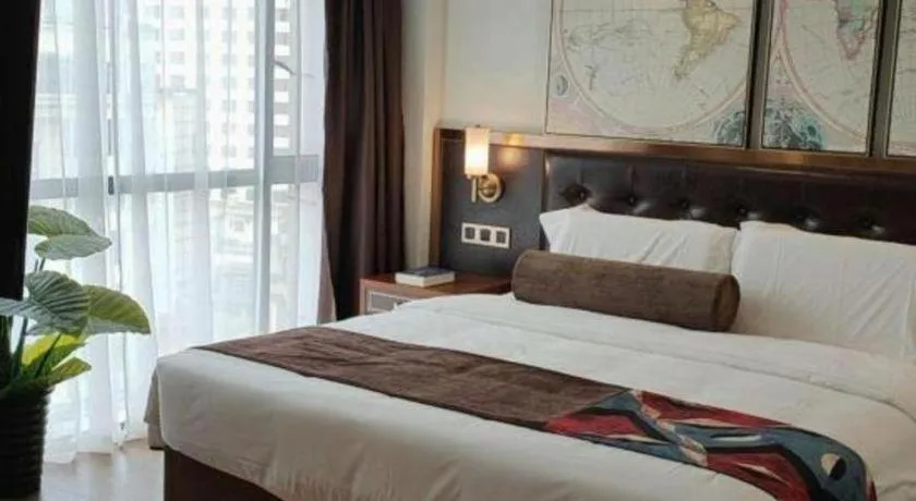 Bed in James Joyce Coffetel Guilin Railway Station Xiangbi Mountain Liangjiang Sihu Wharf