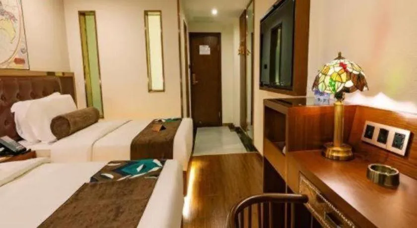 Bed in James Joyce Coffetel Guilin Railway Station Xiangbi Mountain Liangjiang Sihu Wharf