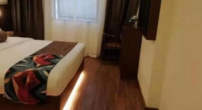 Bed in James Joyce Coffetel Guilin Railway Station Xiangbi Mountain Liangjiang Sihu Wharf