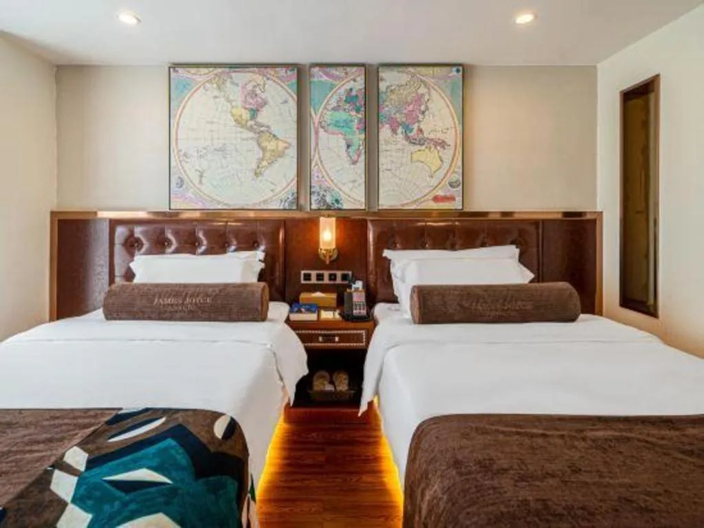 Bed in James Joyce Coffetel Guilin Railway Station Xiangbi Mountain Liangjiang Sihu Wharf