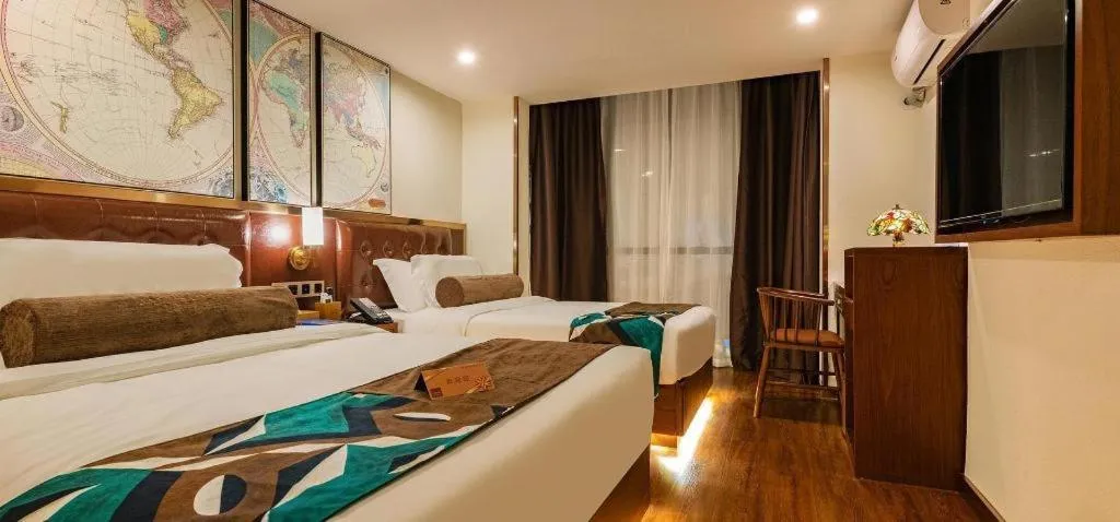 Bed in James Joyce Coffetel Guilin Railway Station Xiangbi Mountain Liangjiang Sihu Wharf