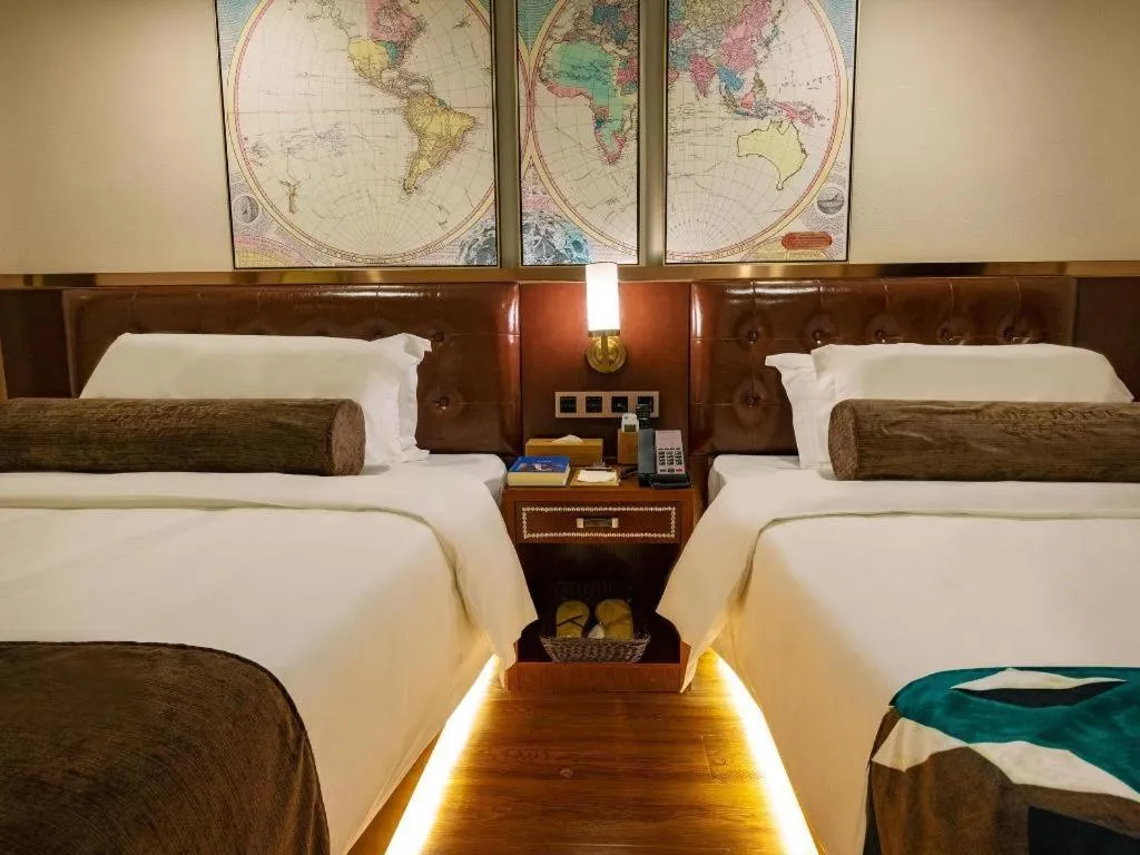 Bed in James Joyce Coffetel Guilin Railway Station Xiangbi Mountain Liangjiang Sihu Wharf