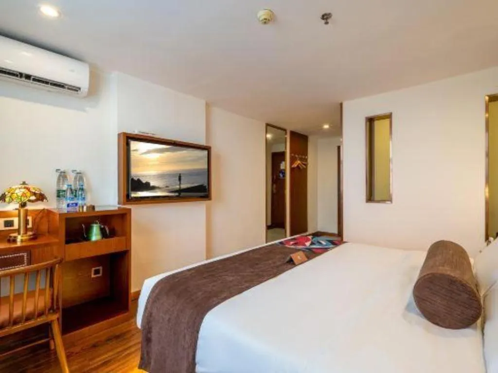 Bed in James Joyce Coffetel Guilin Railway Station Xiangbi Mountain Liangjiang Sihu Wharf