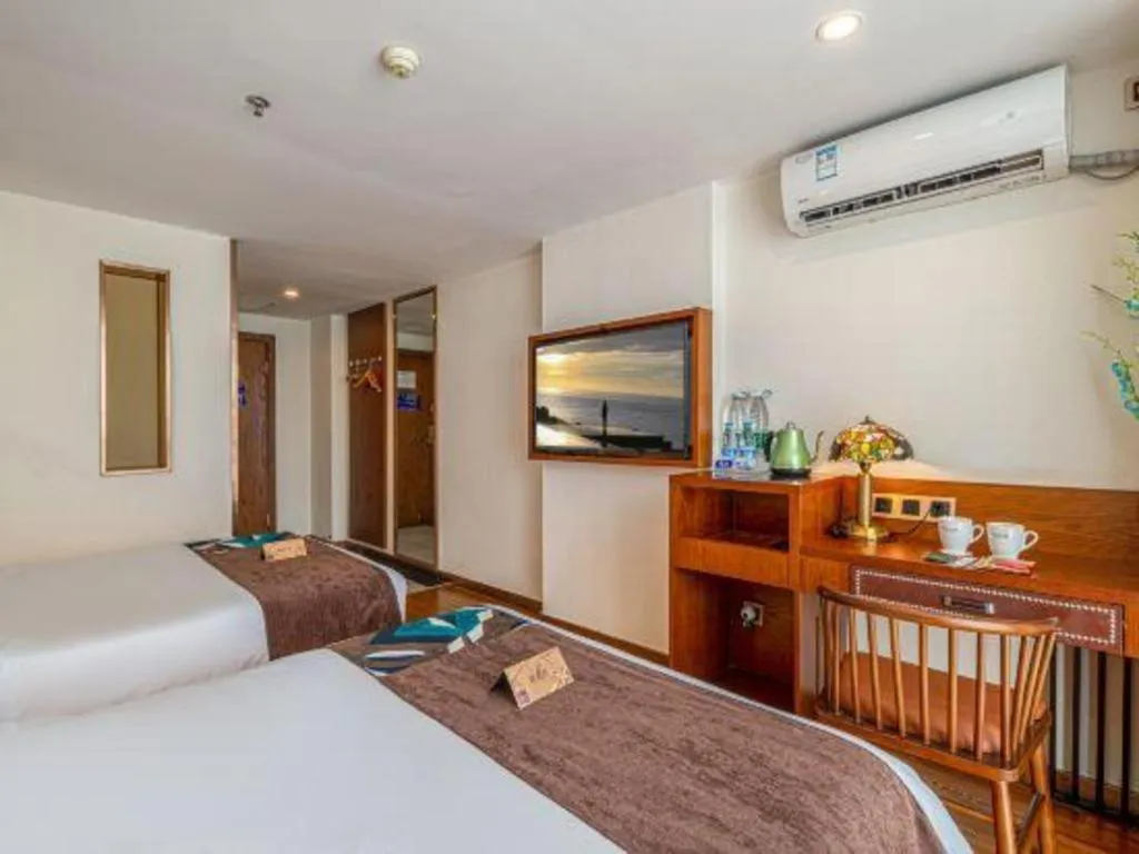 Bed in James Joyce Coffetel Guilin Railway Station Xiangbi Mountain Liangjiang Sihu Wharf