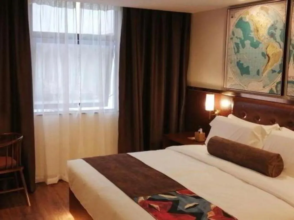 Bed in James Joyce Coffetel Guilin Railway Station Xiangbi Mountain Liangjiang Sihu Wharf