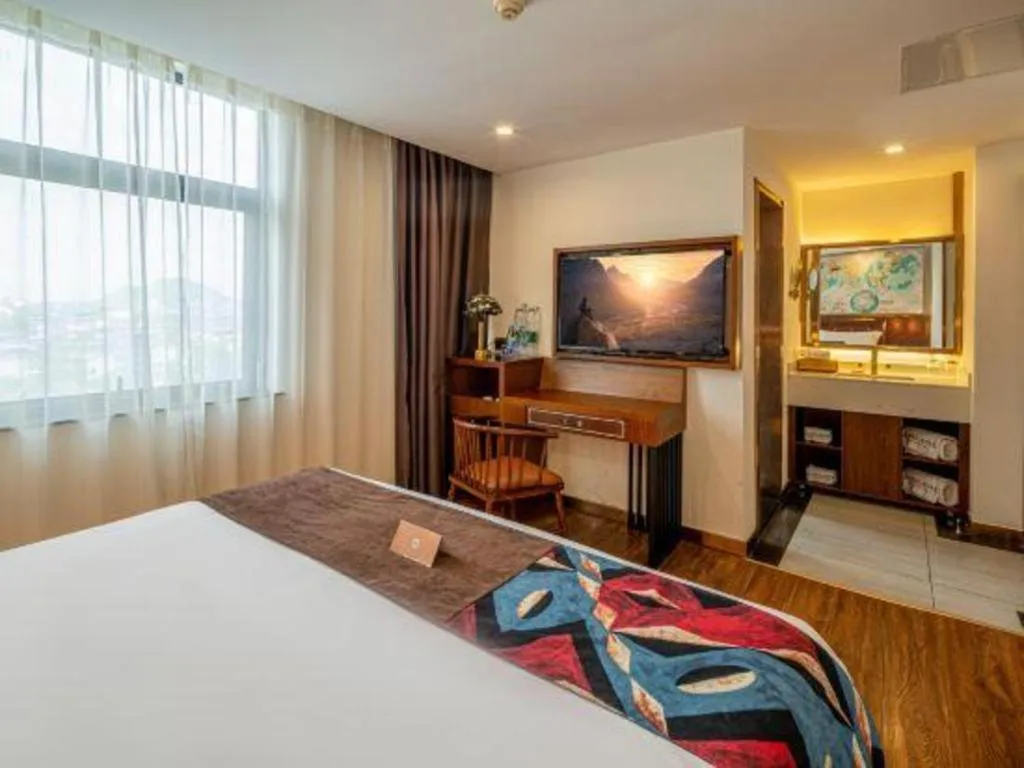 Bed in James Joyce Coffetel Guilin Railway Station Xiangbi Mountain Liangjiang Sihu Wharf