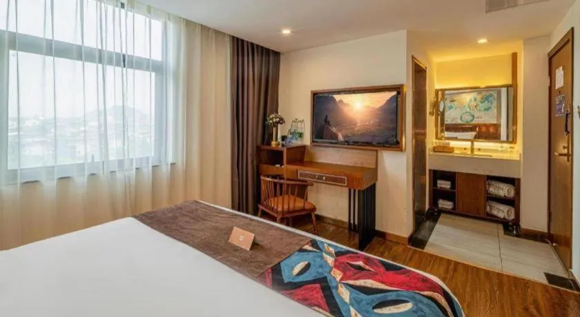 Bed in James Joyce Coffetel Guilin Railway Station Xiangbi Mountain Liangjiang Sihu Wharf