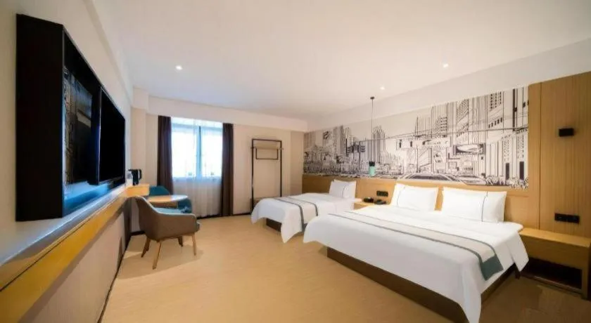 Bed in City Comfort Inn Foshan Sanshui Datang