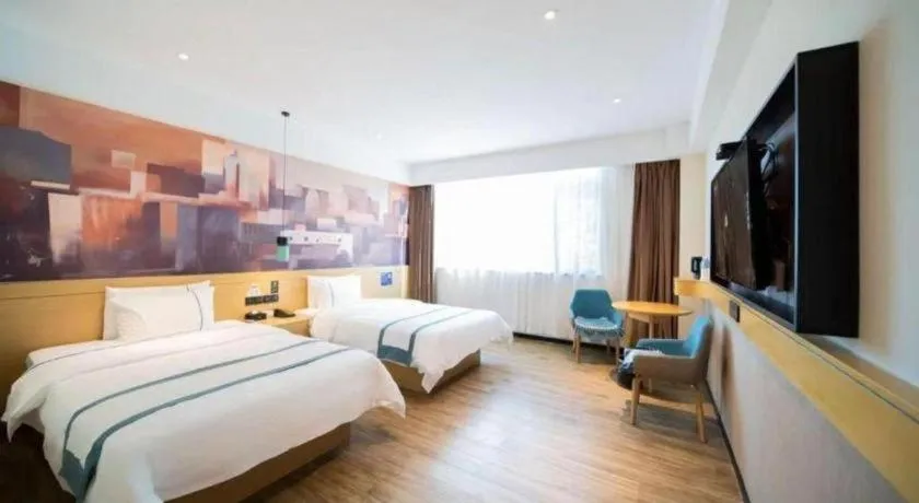 Bed in City Comfort Inn Foshan Sanshui Datang