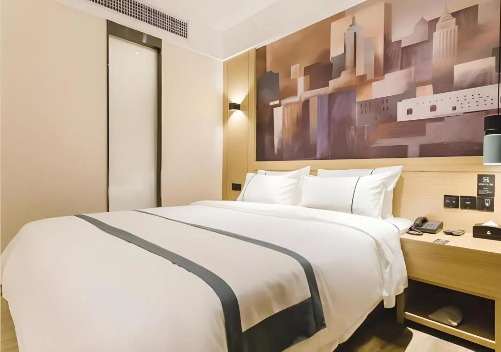 Bed in City Comfort Inn Foshan Sanshui Datang