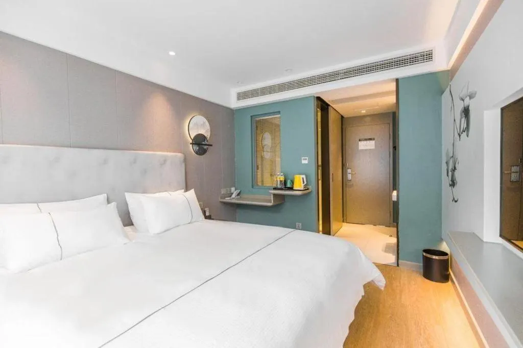 Bed in Magnotel Hotel Huangshan Scenic Area Transfer Center