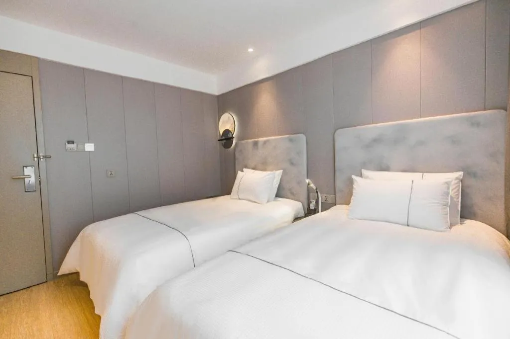 Bed in Magnotel Hotel Huangshan Scenic Area Transfer Center