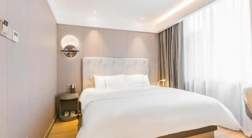 Bed in Magnotel Hotel Huangshan Scenic Area Transfer Center