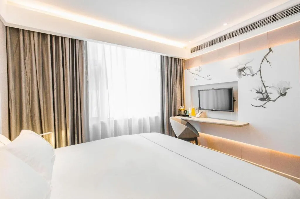 Bed in Magnotel Hotel Huangshan Scenic Area Transfer Center