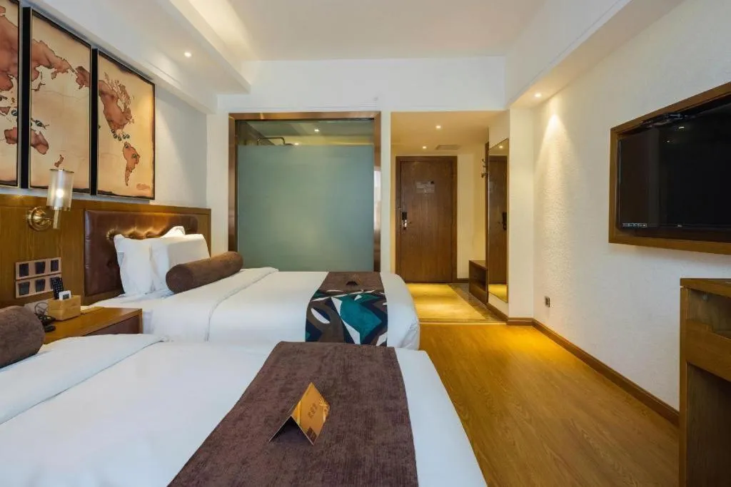 Bed in James Joyce Coffetel Kunming Railway Station Huancheng Nan Road Metro Station