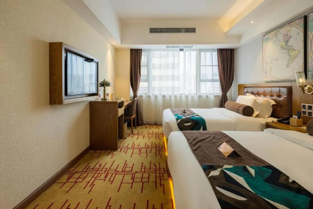 Bed in James Joyce Coffetel Kunming Railway Station Huancheng Nan Road Metro Station