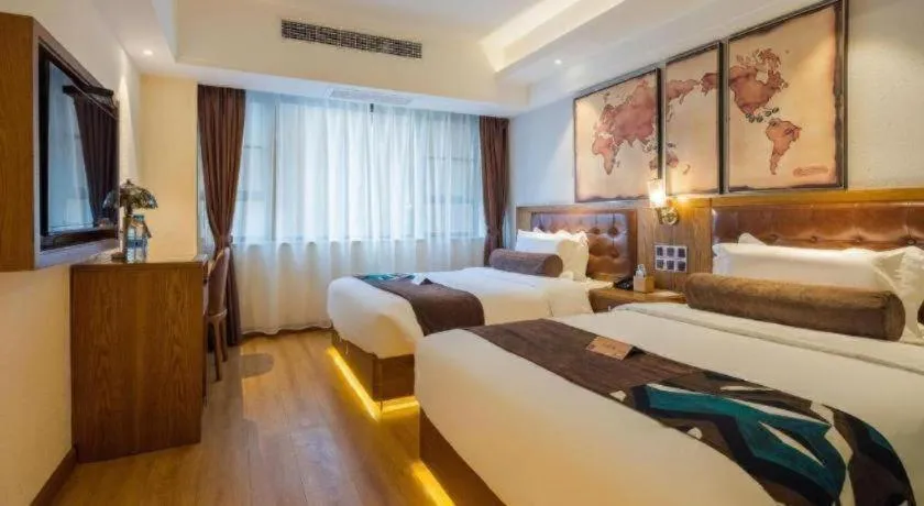 Bed in James Joyce Coffetel Kunming Railway Station Huancheng Nan Road Metro Station