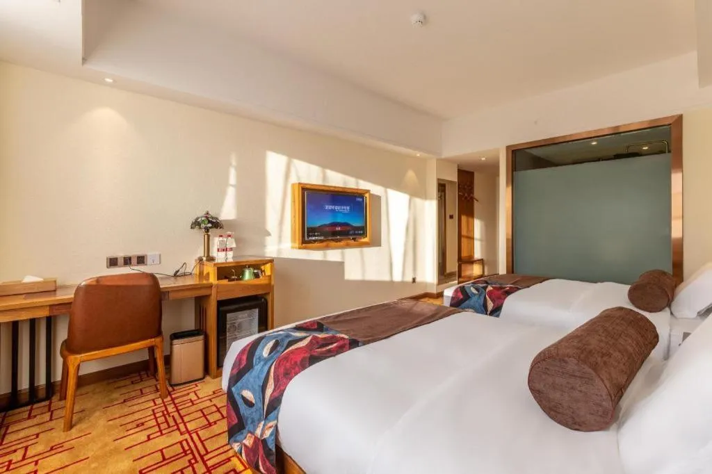 Bed in James Joyce Coffetel Kunming Railway Station Huancheng Nan Road Metro Station