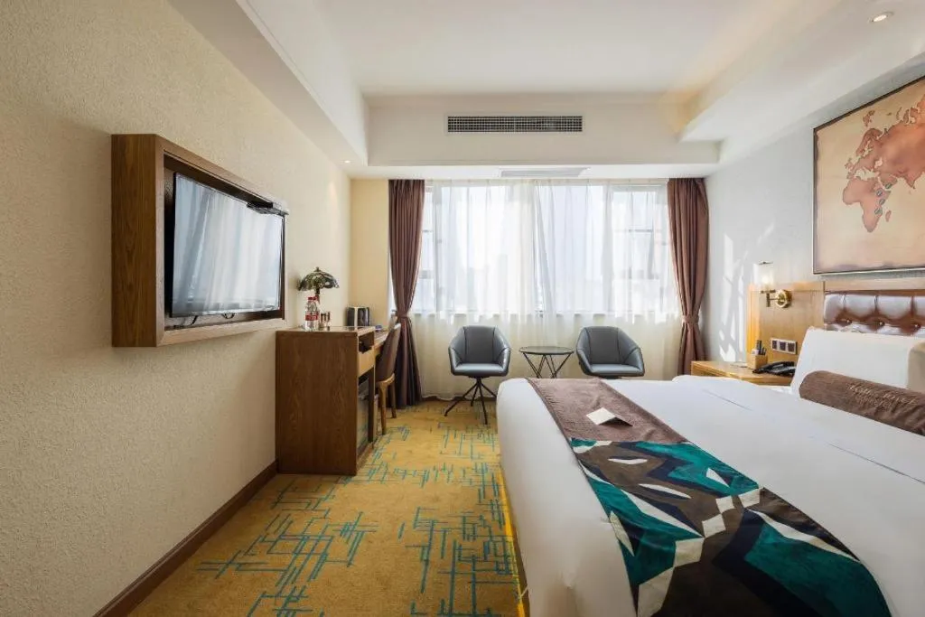 Bed in James Joyce Coffetel Kunming Railway Station Huancheng Nan Road Metro Station