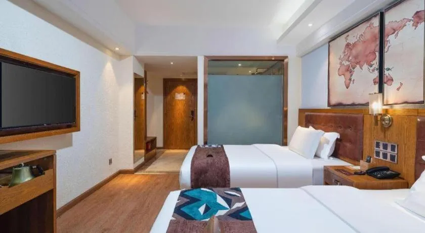 Bed in James Joyce Coffetel Kunming Railway Station Huancheng Nan Road Metro Station