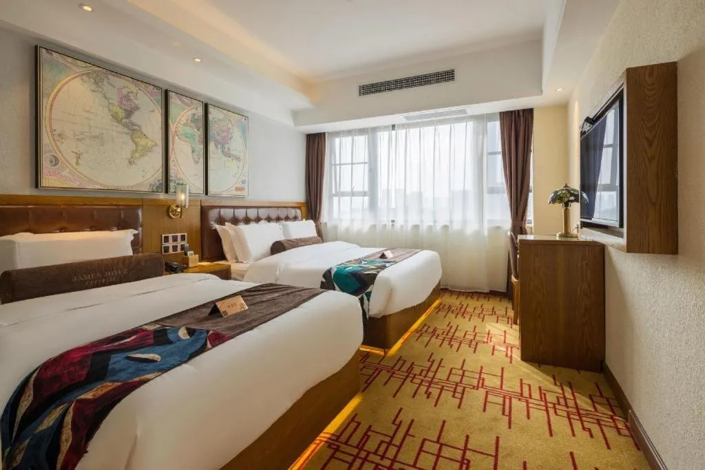 Bed in James Joyce Coffetel Kunming Railway Station Huancheng Nan Road Metro Station