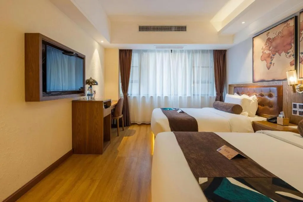 Bed in James Joyce Coffetel Kunming Railway Station Huancheng Nan Road Metro Station