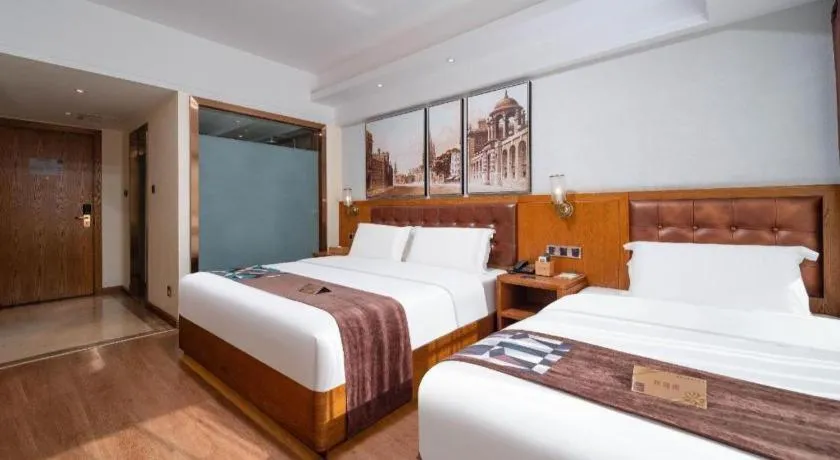 Bed in James Joyce Coffetel Kunming Railway Station Huancheng Nan Road Metro Station