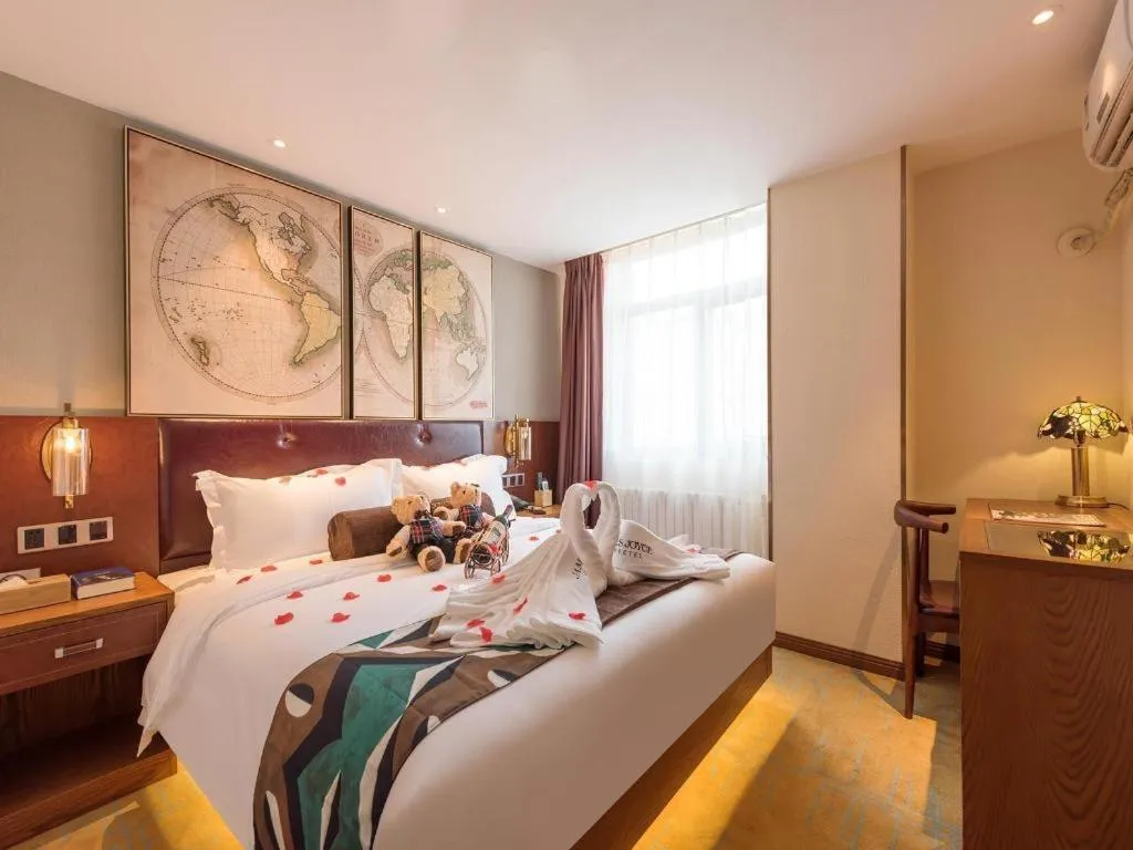 Bed in James Joyce Coffetel Kunming Railway Station Huancheng Nan Road Metro Station