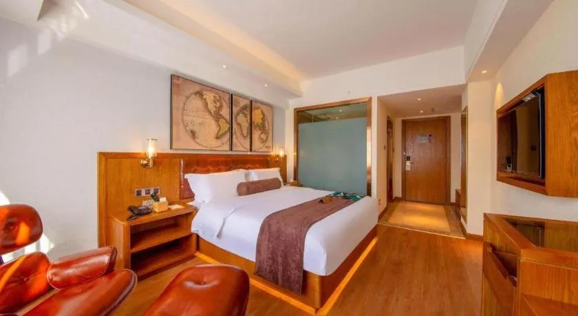 Bed in James Joyce Coffetel Kunming Railway Station Huancheng Nan Road Metro Station