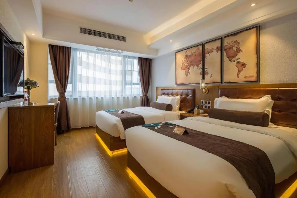 Bed in James Joyce Coffetel Kunming Railway Station Huancheng Nan Road Metro Station