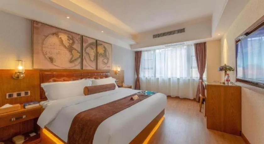 Bed in James Joyce Coffetel Kunming Railway Station Huancheng Nan Road Metro Station