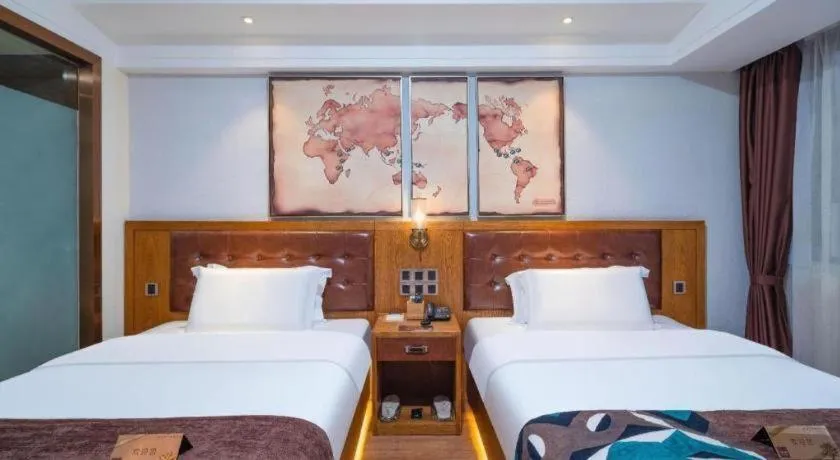 Bed in James Joyce Coffetel Kunming Railway Station Huancheng Nan Road Metro Station