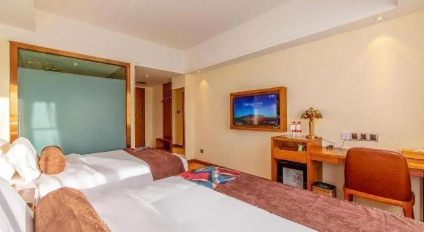 Bed in James Joyce Coffetel Kunming Railway Station Huancheng Nan Road Metro Station