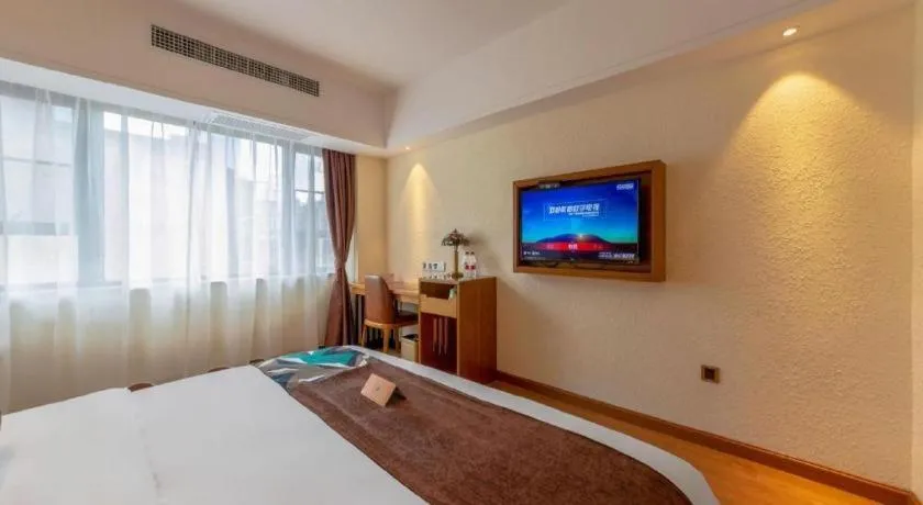 Bed in James Joyce Coffetel Kunming Railway Station Huancheng Nan Road Metro Station