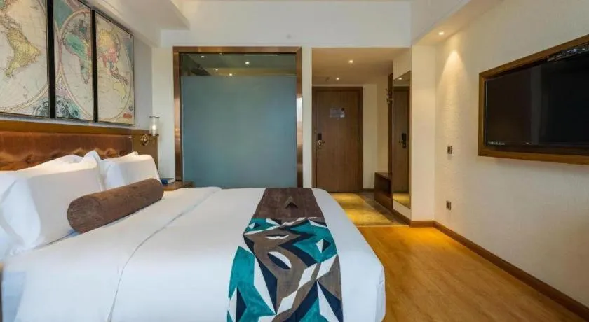 Bed in James Joyce Coffetel Kunming Railway Station Huancheng Nan Road Metro Station