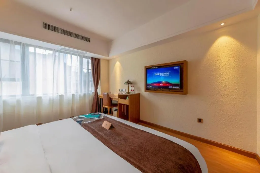 Bed in James Joyce Coffetel Kunming Railway Station Huancheng Nan Road Metro Station