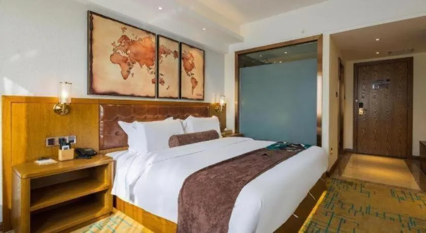 Bed in James Joyce Coffetel Kunming Railway Station Huancheng Nan Road Metro Station