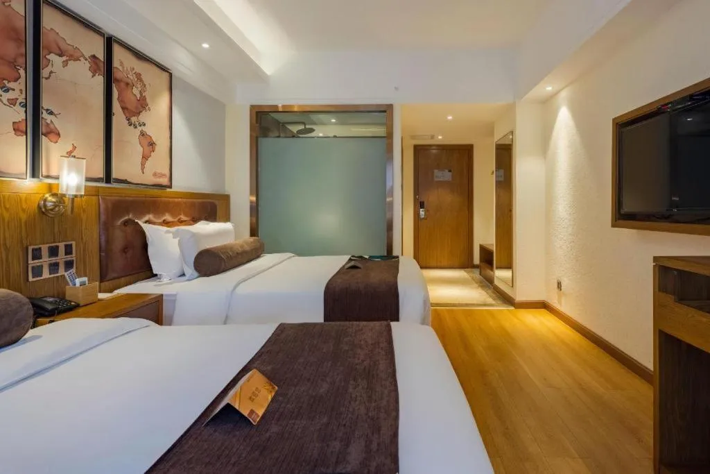 Bed in James Joyce Coffetel Kunming Railway Station Huancheng Nan Road Metro Station