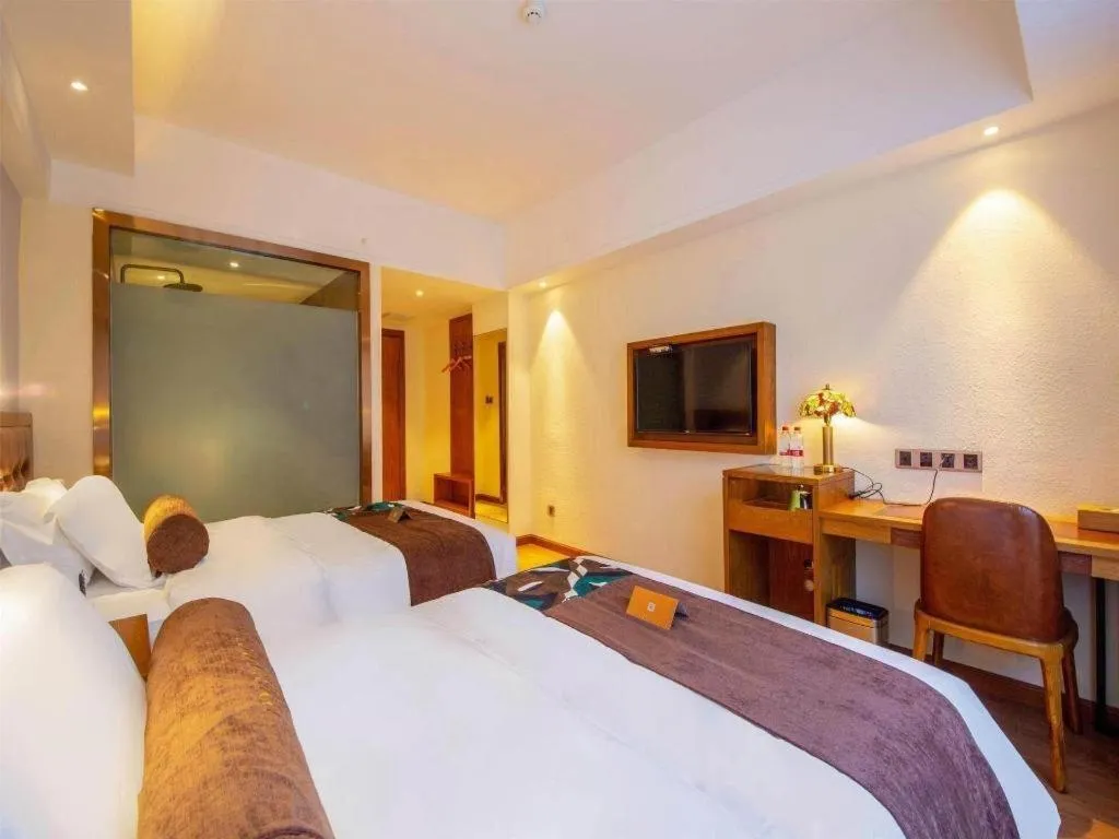 Bed in James Joyce Coffetel Kunming Railway Station Huancheng Nan Road Metro Station