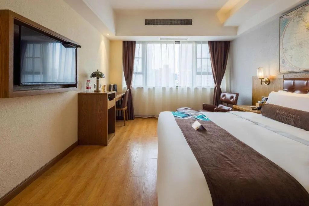 Bed in James Joyce Coffetel Kunming Railway Station Huancheng Nan Road Metro Station